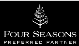 Logo of Four Seasons Hotels, featuring the words 'FOUR SEASONS' and 'PREFERRED PARTNER' with a tree graphic above on a black background.