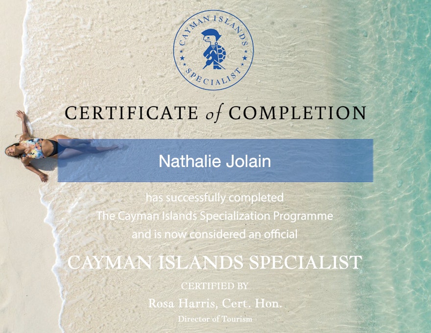 A certificate of completion for Nathalie Jolain, stating successful completion of the Cayman Islands Specialization Programme, certified by Rosa Harris, Director of Tourism.